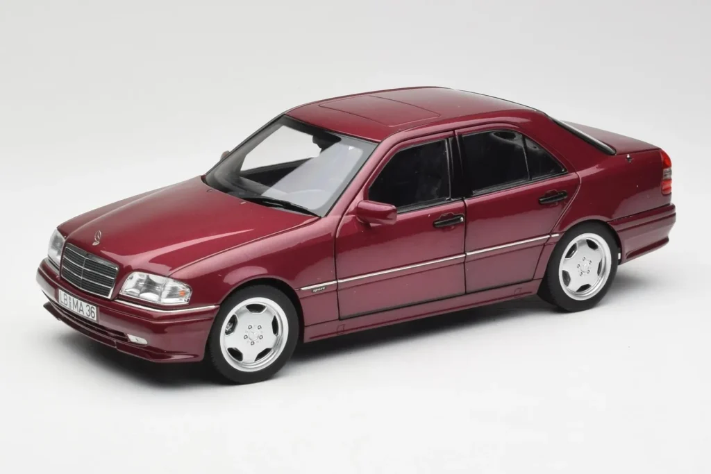 โมเดลรถ 1:18 Mercedes AMG C36 W202 Almandine สีแดง Norev (มือสอง)