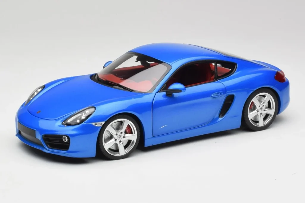 โมเดลรถ 1:18 Porsche Cayman 981 S Aqua สีน้ำเงินเมทัลลิก Minichamps (มือสอง)
