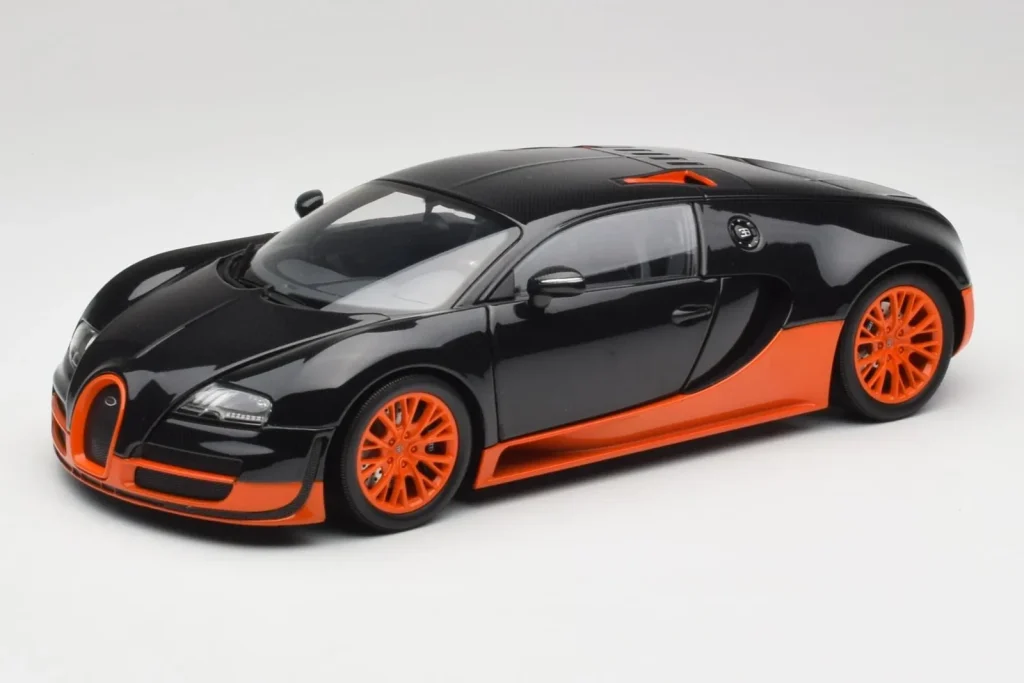 Model 1:18 Bugatti Veyron Super Sport World Record Edition Carbon & Orange Minichamps