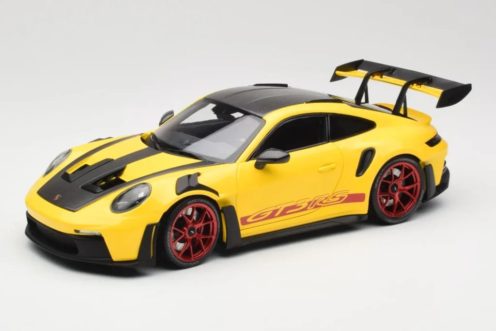 Model 1:18 Porsche 911 992 GT3 RS Racing Yellow Weissach Package & Red Wheels Minichamps