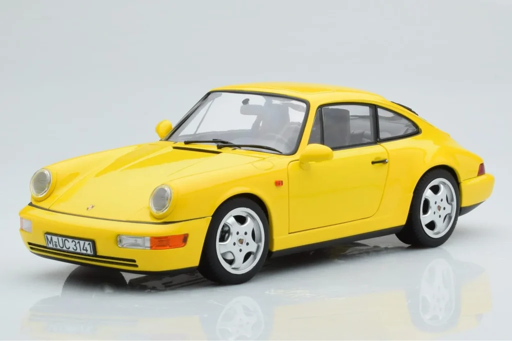 โมเดลรถ 1:18 Porsche 911 964 Carrera 2 สีเหลือง Norev